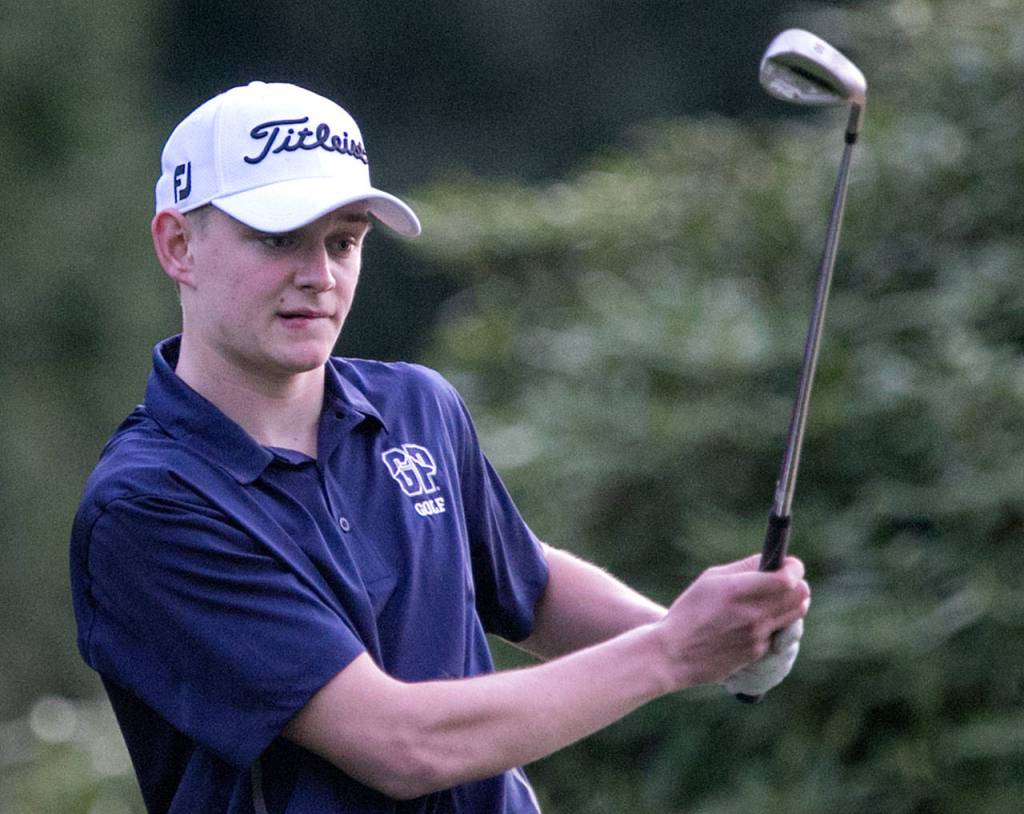 Glacier Peaks Tyler Spalti watches his ball during the annual Tom Dolan Memorial Invitational at Everett Golf and Country Club Monday afternoon. (Kevin Clark / The Herald)