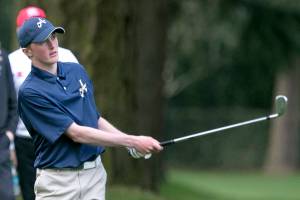 Arlingtons Cody Oakes watches his ball during the sudden death playoff during the annual Tom Dolan Memorial Invitational at Everrett Golf and Country Club Monday afternoon in Everett on April 9, 2018. (Kevin Clark / The Daily Herald)