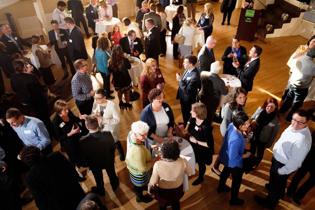 Guests and finalists mingle at the Herald Business Journals Emerging Leader gala at the Marysville Opera House. on Thursday. (Andy Bronson / The Herald)