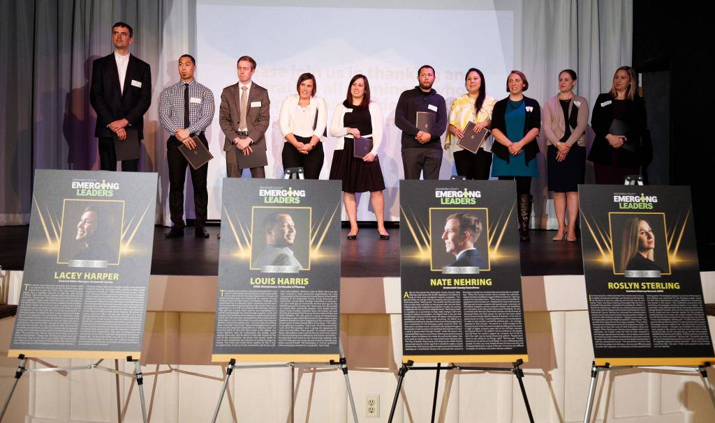 Finalists stand on stage at the Herald Business Journals Emerging Leader gala at the Marysville Opera House on Thursday. (Andy Bronson / The Herald)