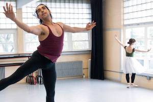 Olympic Ballet Theatre dancer Alberto Gaspar leaps as Airi Miyata goes through her steps during a Coppelia rehearsal. The comedy ballet is showing April 14-15 at the Edmonds Center for the Arts. (Andy Bronson / The Herald)