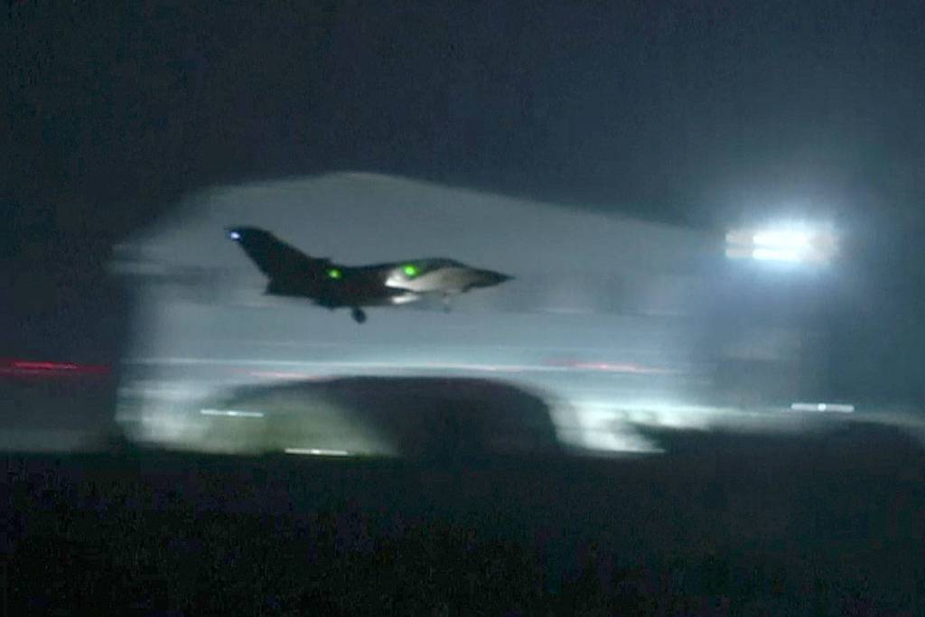 A fighter jet lands at Akrotiri British Royal Air Force Base on Cyprus on Saturday. Fighter jets were seen taking off from the RAF base in Cyprus early Saturday morning. Their destination was not revealed. (AP Video)