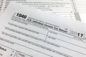 Editorial: What if the IRS did our taxes for us?
