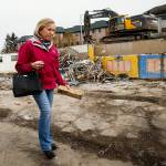 Longtime Grace United Methodist Church office manager Linda Doyle finds a memento  an intact yellow brick  to remind her of all the good memories here. But Doyle and many church members are excited about Cocoon Houses new home. (Dan Bates / The Herald)