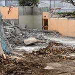 A farewell glimpse at the basement in what was the Spirit of Grace United Methodist Church. Many a cup of coffee went slowly down, down here. With cake, likely. Many a laugh or speech or toast echoed off these walls. The backhoe and trucks can have the concrete walls and bricks. The voices, laughter, tears, hugs and kisses remain with former church members. (Dan Bates / The Herald)