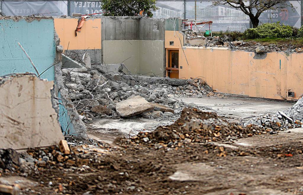 A farewell glimpse at the basement in what was the Spirit of Grace United Methodist Church. Many a cup of coffee went slowly down, down here. With cake, likely. Many a laugh or speech or toast echoed off these walls. The backhoe and trucks can have the concrete walls and bricks. The voices, laughter, tears, hugs and kisses remain with former church members. (Dan Bates / The Herald)