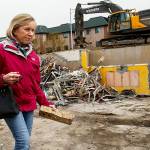 Longtime Grace United Methodist Church office manager Linda Doyle finds a mementoan intact yellow brickto remind her of all the good memories here. But Doyle and many church members are excited about Cocoon Houses new home. (Dan Bates / The Herald)