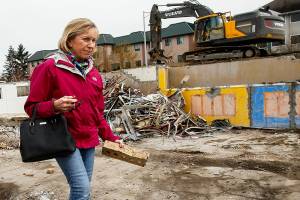 Longtime Grace United Methodist Church office manager Linda Doyle finds a mementoan intact yellow brickto remind her of all the good memories here. But Doyle and many church members are excited about Cocoon Houses new home. (Dan Bates / The Herald)