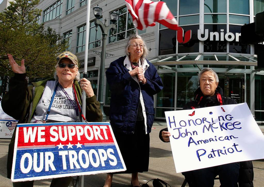 Audrey McKee (left), 80, Arlene Noyes, 85, and Eva Chapman on Friday gathered as usual at Hewitt and Colby in downtown Everett  this time to honor McKees late husband, John, who died April 8. (Dan Bates / The Herald)
