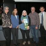 Robyn Smith of Equine Life Solutions in Bothell (center) is named a Conservation Leader of the Year by (from left) Maia Bellon, Washington Department of Ecology director; Stephanie Wright, Snohomish County Council chair; Mark Craven, Snohomish Conservation District Board chair; and Monte Marti, SCD district manager. (Contributed photo)