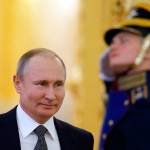 Russian President Vladimir Putin enters a hall to chair a meeting of the State Council in Moscow on April 5. (Alexander Zemlianichenko)