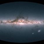 This image is the Gaia satellites all-sky view of our Milky Way Galaxy and neighboring galaxies, based on measurements of nearly 1.7 billion stars. The map shows the total brightness and color of stars observed by the European Space Agency satellite in each portion of the sky between July 2014 and May 2016. (ESA via AP)
