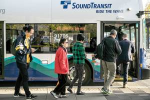 With commuter lots clogged, Sound Transit plans parking fees