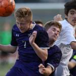 Kamiaks Kaydin Wall heads the ball as Kamiak beat Lake Stevens 2-1 in a soccer match on Tuesday, April 24, 2018 in Lake Stevens, Wa. (Andy Bronson / The Herald)
