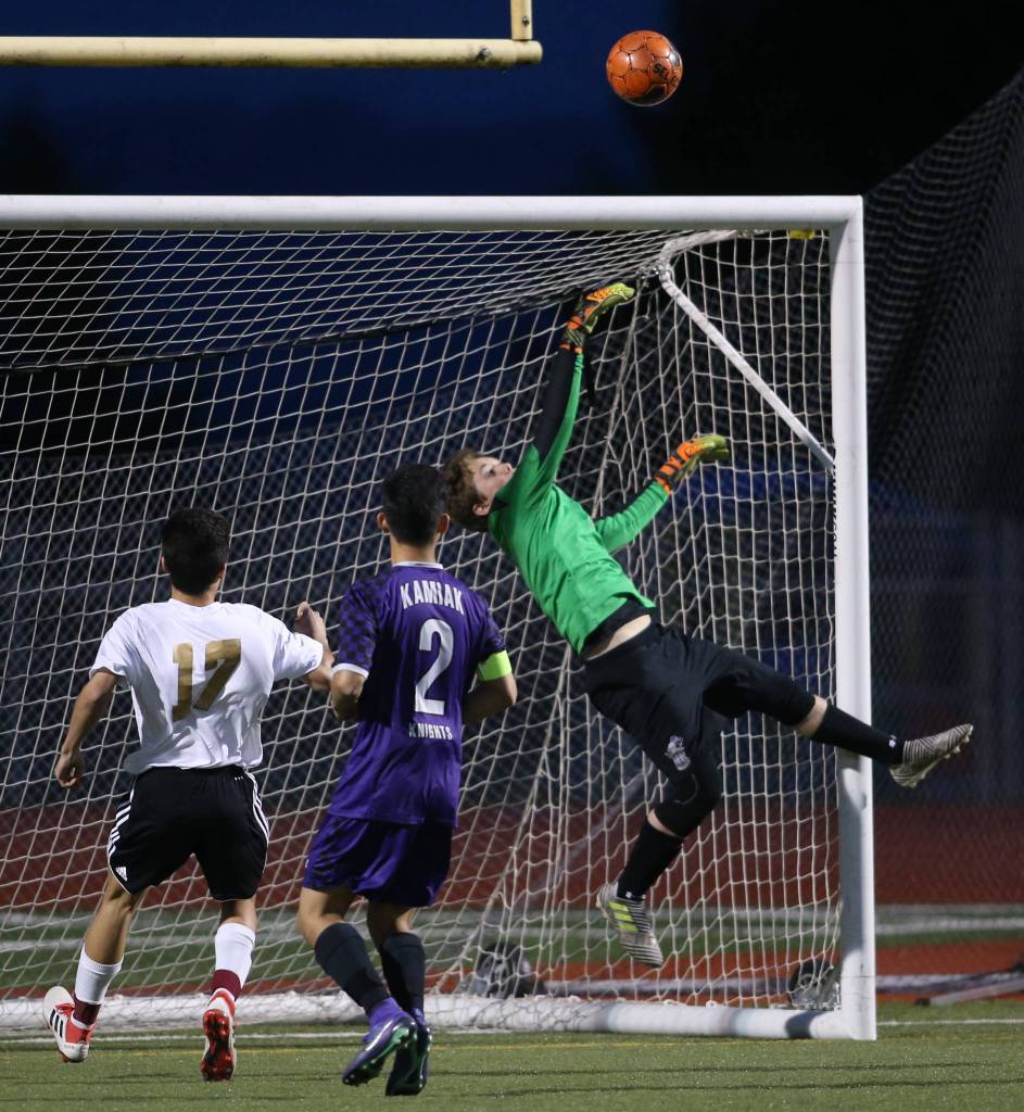 Kamiak goalie Connor Bourne makes a save as beat Lake Stevens 2-1 in a soccer match, with two Lake Stevens goals called back, on Tuesday, April 24, 2018 in Lake Stevens, Wa. (Andy Bronson / The Herald)