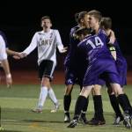 Kamiaks Noah Venditto is surrounded by teammates after scoring the second goal as Kamiak beat Lake Stevens 2-1 in a soccer match on Tuesday, April 24, 2018 in Lake Stevens, Wa. (Andy Bronson / The Herald)