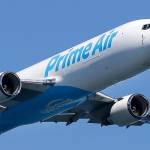 A Boeing 767 freighter with an Amazon.com Prime Air livery flies over Lake Washington in 2016 as part of the Boeing Seafair Air Show. (AP Photo/Ted Warren)