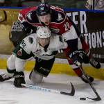 The Silvertips Connor Dewar (bottom) is take down by Tri-Citys Morgan Geekie during Game 5 of the Western Conference finals on April 28, 2018, at Angel of the Winds Arena in Everett. (Kevin Clark / The Herald)