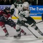 The Silvertips Matt Fonteyne (right) makes a run at goal with Tri-Citys Nolan Yaremko trailing during Game 5 of the Western Conference finals on April 28, 2018, at Angel of the Winds Arena in Everett. (Kevin Clark / The Herald)
