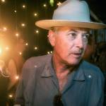 This 2011 photo shows Larry Harvey, co-founder of the Burning Man festival, during a party at Media Mecca, the communications center, during the festival in the Black Rock Desert in Nevada. (John Curley via AP)