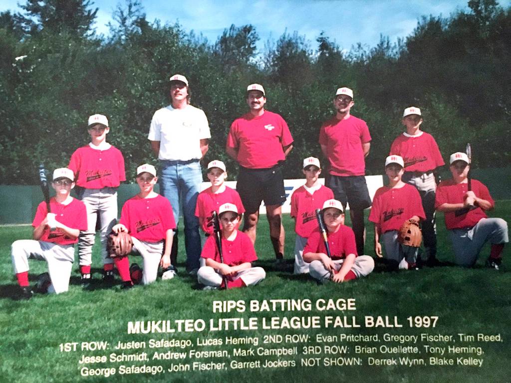 Brian Ouellette, at age 11, stands in the back row of a Mukilteo Little League team photo in fall 1997. Two spots to the right is coach George Safadago. Twenty-one years later, Ouellette would be a lead paramedic who helped save Safadagos life when he suffered a cardiac arrest. (Brian Ouellette)