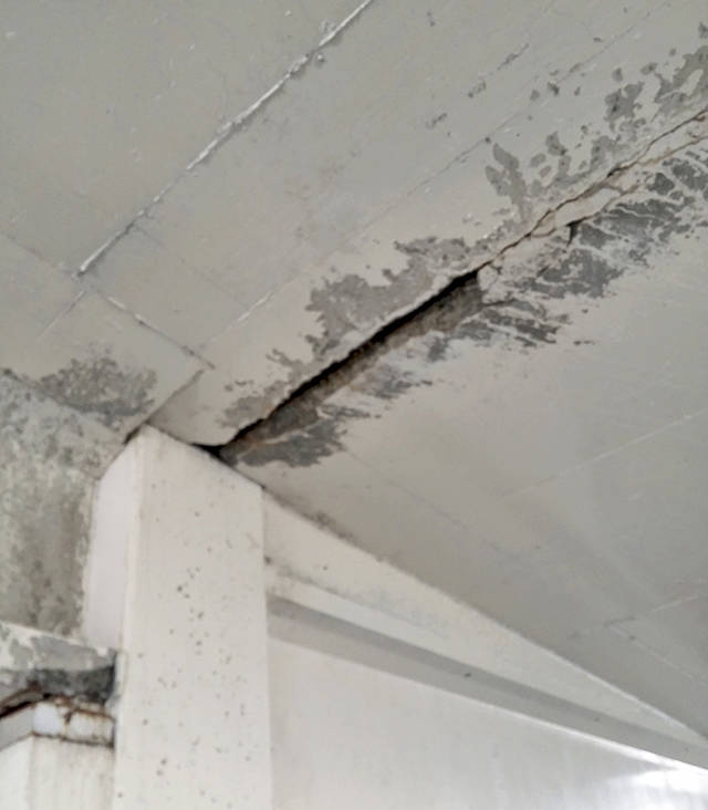 Damaged concrete and exposed rebar are among the problems scheduled for repair at the city-owned Everpark Garage in Everett. (Rikki King / The Herald)