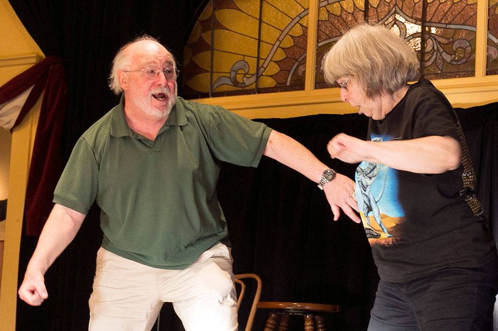 Crackpot Comedy Cavalcade members Bill Dewey and Nancy Dewey work through a skit at an improv class at the Tim Noah Thumbnail Theater in Snohomish. (Kevin Clark / The Herald)