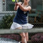 Everetts Abby Affholter backhands a shot during an April 30 match in Everett. (Andy Bronson / The Herald)