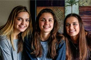 With graduation approaching quickly at Cascade High School, senior triplets (from left) Amanda, Brooke and Courtney Alcayaga take time to talk about their brother Michael, who died of leukemia in 2014, and about their futures. The triplets have been active in Cascade sports, and the school continues to honor Michael with an annual baseball game. (Dan Bates / The Herald)