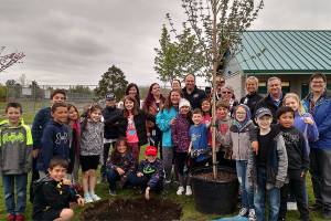 Fryelands third-graders plant tree at park for Arbor Day