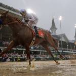 Mike Smith rides Justify to victory during the 144th running of the Kentucky Derby on May 5, 2018, at Churchill Downs in Louisville, Ky. (AP Photo/Morry Gash)