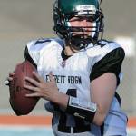 Everett Reign quarterback Michele Walsh looks for an open receiver during a game last season. (Everett Reign)