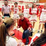 Stanwood High School coach Dennis Kloke addresses his team during a timeout against Everett High School in Stanwood on Dec. 13. (Kevin Clark / The Daily Herald)