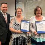 Renee Bigwarfe (center) and Betty Wright who volunteer to help serve lunches at Marysville Middle School are honored by Mayor Jon Nehring as Volunteers of the Month at the April 23 meeting of the Marysville City Council. (Contributed photo)