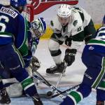 The Silvertips Sean Richards (middle) works the crease with Swift Current players defending during Game 5 of the WHL championship series on May 11, 2018, at Angel of the Winds Arena in Everett. (Kevin Clark / The Herald)