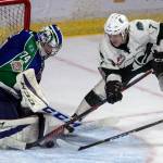 The Silvertips Martin Fasko-Rudas (right) works for a shot with Swift Current goalie Stuart Skinner defending during Game 5 of the WHL championship series on May 11, 2018, at Angel of the Winds Arena in Everett. (Kevin Clark / The Herald)
