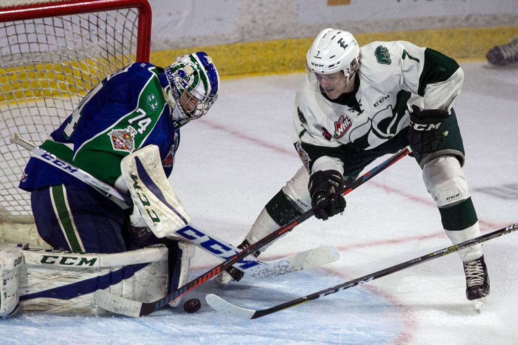 The Silvertips Martin Fasko-Rudas (right) works for a shot with Swift Current goalie Stuart Skinner defending during Game 5 of the WHL championship series on May 11, 2018, at Angel of the Winds Arena in Everett. (Kevin Clark / The Herald)
