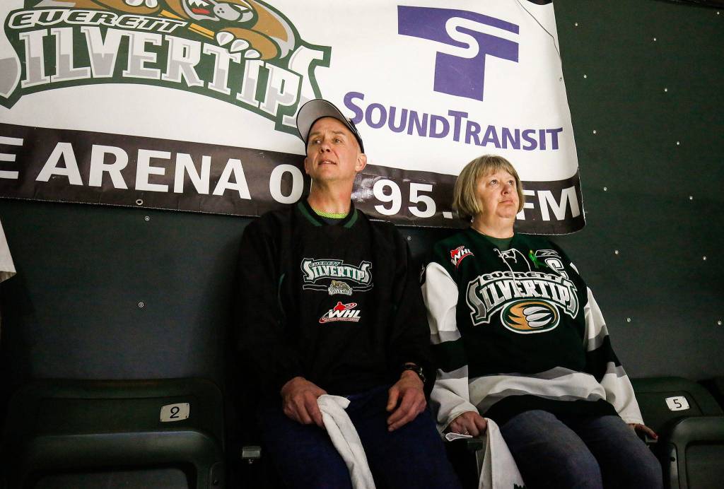 Season ticket holders Teresa Sarsted and her husband Bill react after watching the Everett Silvertips lose 3-2 in overtime to the Swift Current Broncos at the Angel of the Winds Arena in Game 3 of the WHL Finals on May 8 in Everett. (Andy Bronson / The Herald)