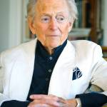 In this 2016 photo, American author and journalist Tom Wolfe appears in his living room during an interview about his book, The Kingdom of Speech, in New York. Wolfe died at a New York City hospital. He was 87. (AP Photo/Bebeto Matthews, File)
