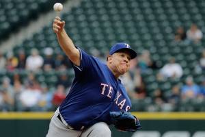 Colon baffles the Mariners in Rangers’ 5-1 win