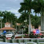 Police respond to the Trump National Doral Golf Club after reports of a shooting inside on Friday. (AP Photo/Frieda Frisaro)
