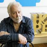 In this 2009 photo, artist Robert Indiana poses at his studio in Vinalhaven, Maine. (AP Photo/Joel Page, File)
