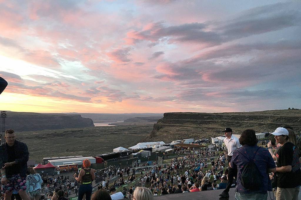 A brilliant sunset fills the sky over the river and Gorge Amphitheatre campus Friday.