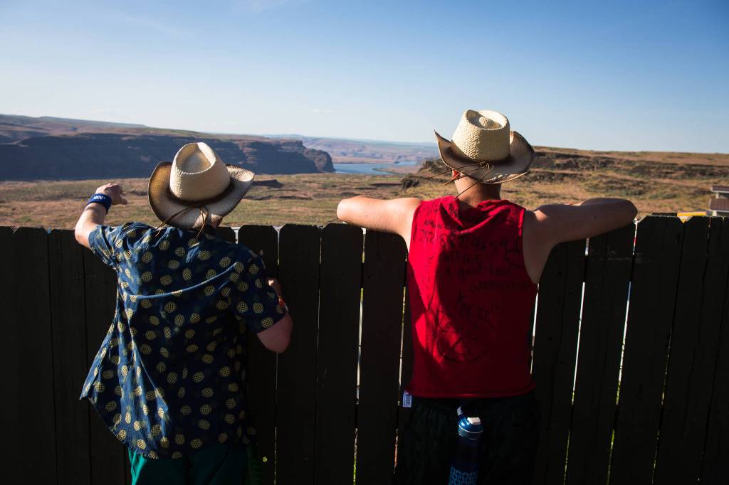Festival-goers look out over the Columbia River Gorge during day two of the annual Sasquatch! Music Festival on May 27, 2017 in George. (Daniella Beccaria / For the Herald)