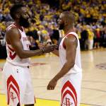 Houstons Chris Paul (right) shakes hands with teammate James Harden after Tuesdays game in Oakland, Calif. (AP Photo/Marcio Jose Sanchez)