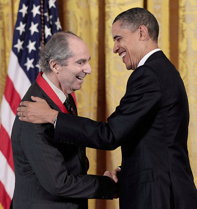 In this March 2, 2011, photo, President Barack Obama presents a National Humanities Medal to novelist Philip Roth during a ceremony in the East Room of the White House in Washington. (AP Photo/Pablo Martinez Monsivais, file)