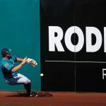 Seattles John Andreoli is unable to make a catch on a double hit by Clevelands Roberto Perez during the third inning of a spring training game Feb. 28 in Goodyear, Ariz. (AP Photo/Ross D. Franklin)