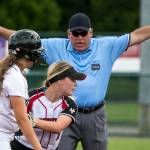 Bonney Lakes Brynn Nelson is called safe after a tag attempt by Snohomishs Ruby Butler on Saturday 3A softball championship game at the Regional Athletic Complex in Lacey. (Kevin Clark / The Herald)