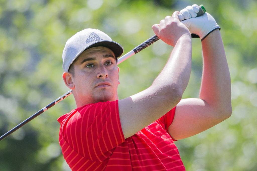 Joel Micka tees off on the second day of the 2018 Snohomish County Amateur golf tournament on May 27, 2018, at Harbour Pointe Golf Course in Mukilteo. (Kevin Clark / The Herald)