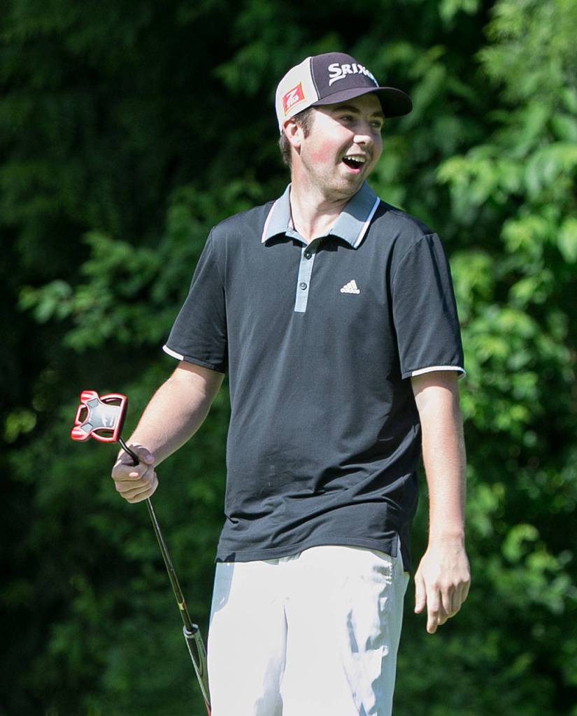 Halen Davis reacts to a putt on the second day of the 2018 Snohomish County Amateur golf tournament on May 27, 2018, at Harbour Pointe Golf Course in Mukilteo. (Kevin Clark / The Herald)